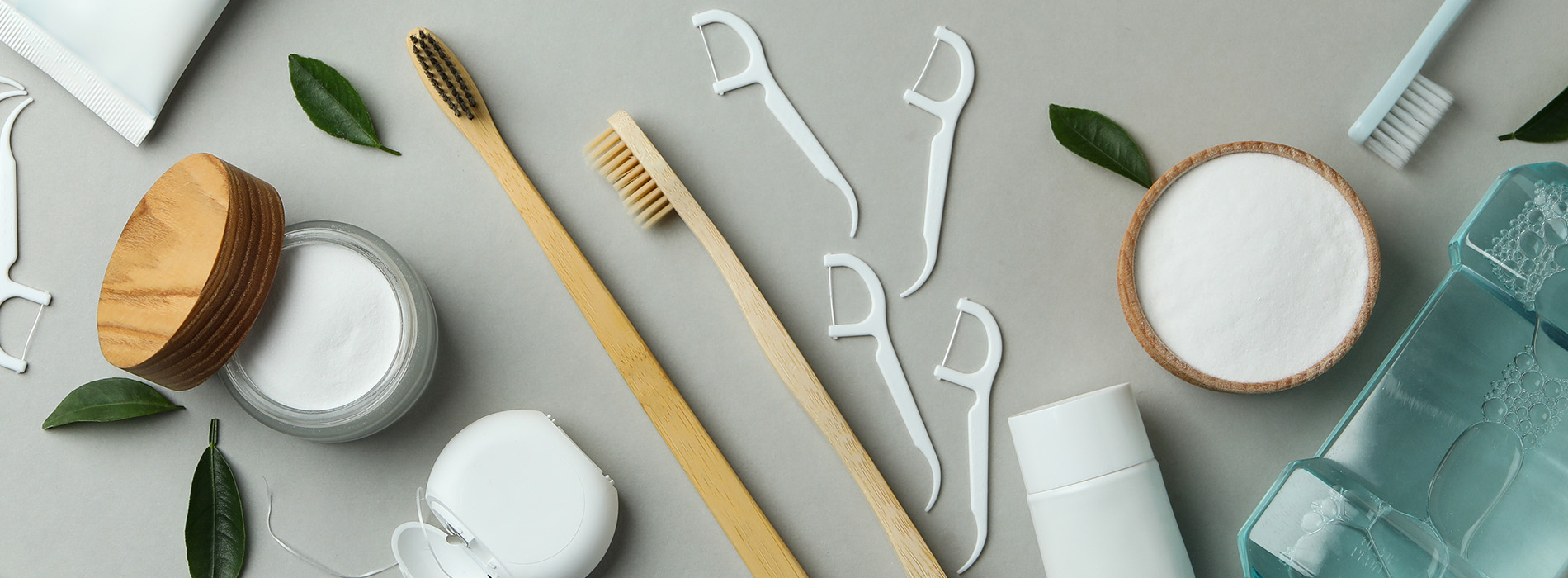 The image shows a collection of skincare products on a table with a clean, minimalist aesthetic and a focus on natural ingredients.