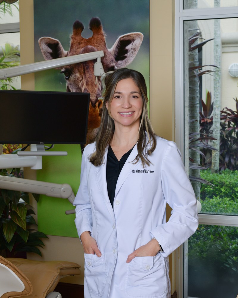 Dr. Magela Martinez, DMD, owner and lead cosmetic dentist at Sunset Smiles Cosmetic Dentistry in Jupiter, FL