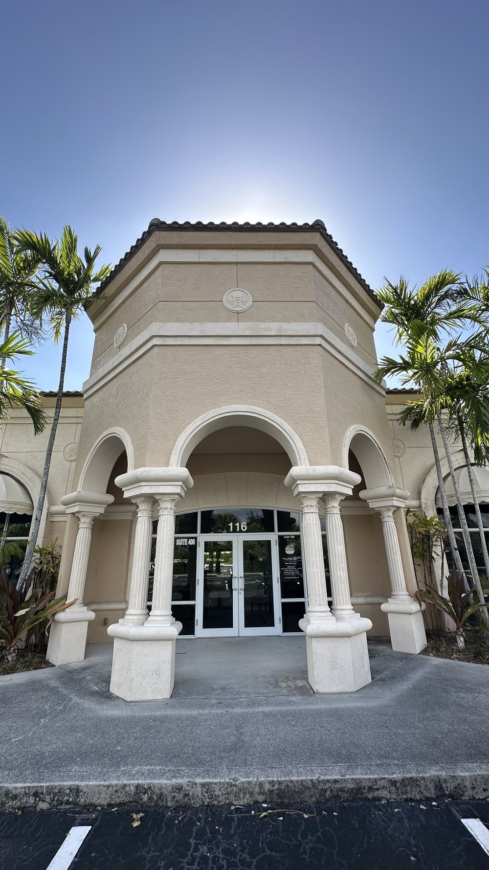 Arched front entrance of Sunset Smiles Cosmetic Dentistry, Jupiter FL
