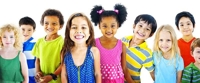A group of children smiling at the camera, with diverse skin tones and clothing colors, against a white background.
